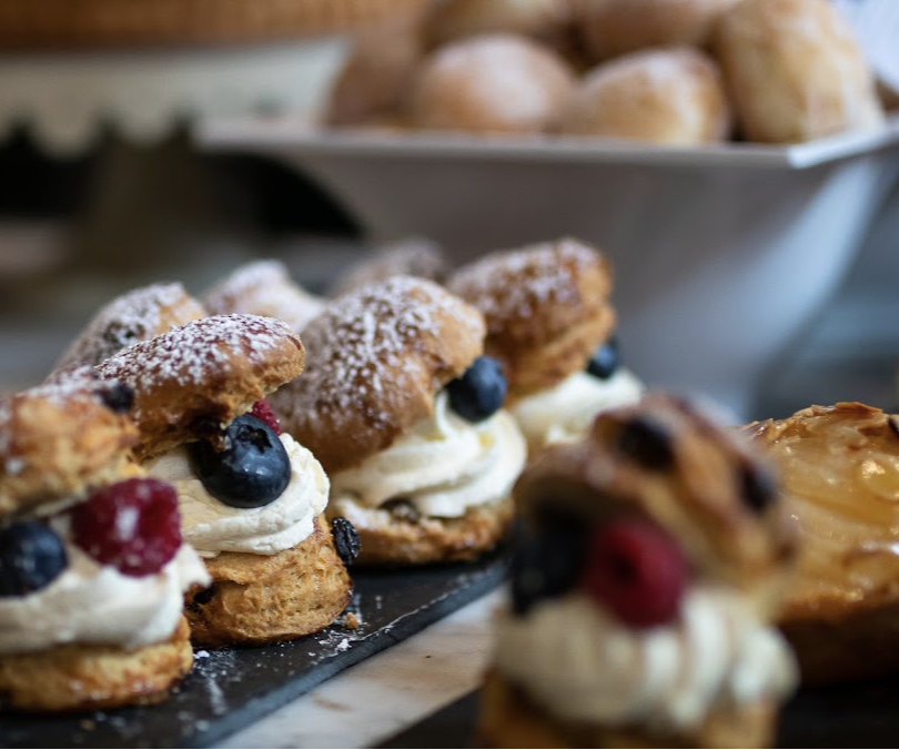 Cream-filled choux pastries with berries